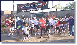 The Gun Sounds for the First Annual 'Hills of Homer' Christmas Run held last Saturday during the 2006 Claiborne Christmas Festival in downtown Homer.